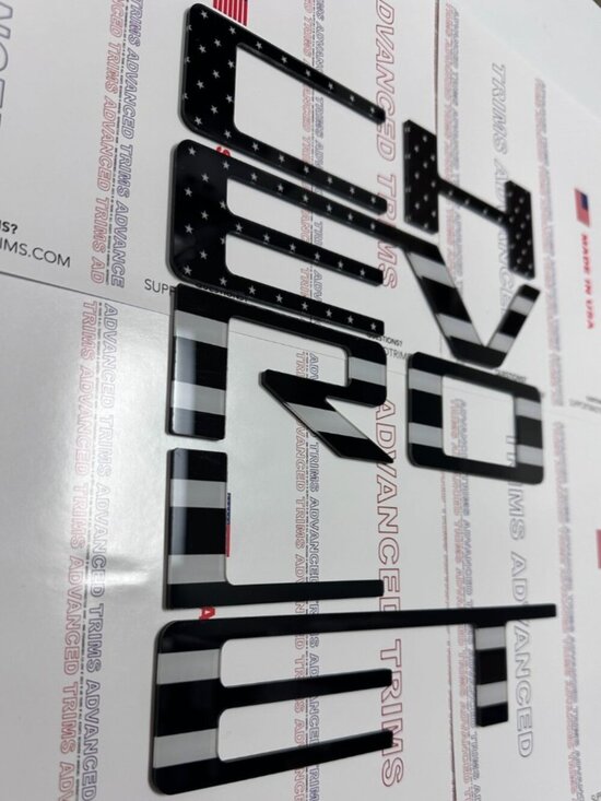 Advanced Trims Other - 3D US BLACKENED FLAG RAISED TAILGATE LETTERS FOR 2023 24 25 2026 COLORADO
